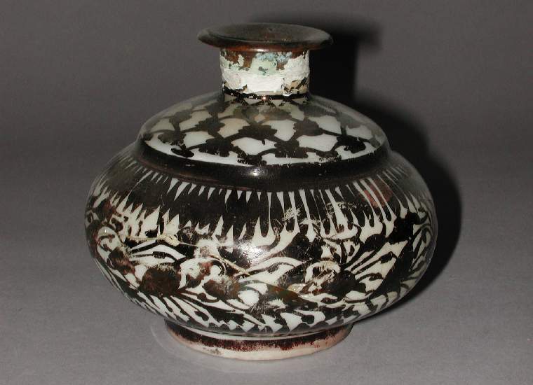 An image of Spittoon