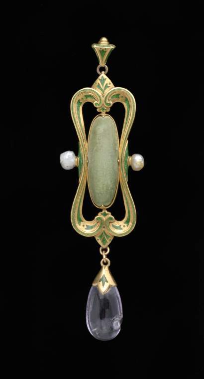 An image of Jewellery. Pendant. Carlo & Arthur Giuliano. Ricketts, Charles de Sousy, designer (British, 1866-1931). Gold, decorated with translucent green enamel, and set with a central cabochon green turquoise, with a pearl on each side, and an amethyst drop below, having at the top a triangular loop to take a chain. Height, whole, 8.3 cm, 1899. Renaissance Revival. Victorian. Acquisition: Grundy, J. Hull, Mrs.