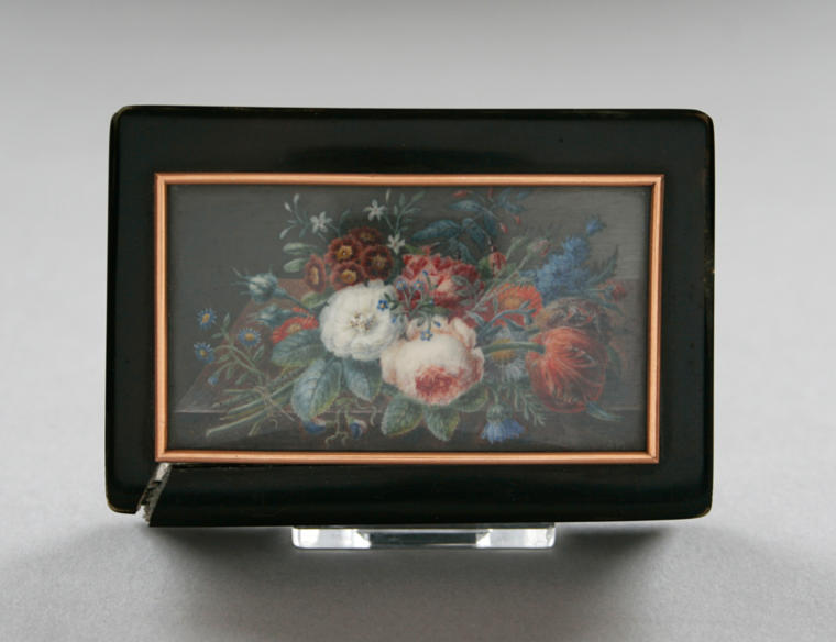 An image of box with flower miniture