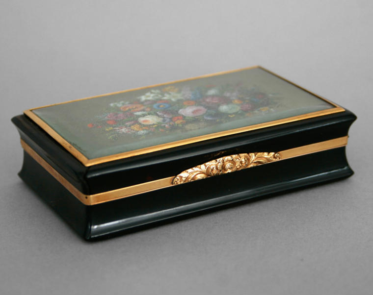 An image of box with flower miniture