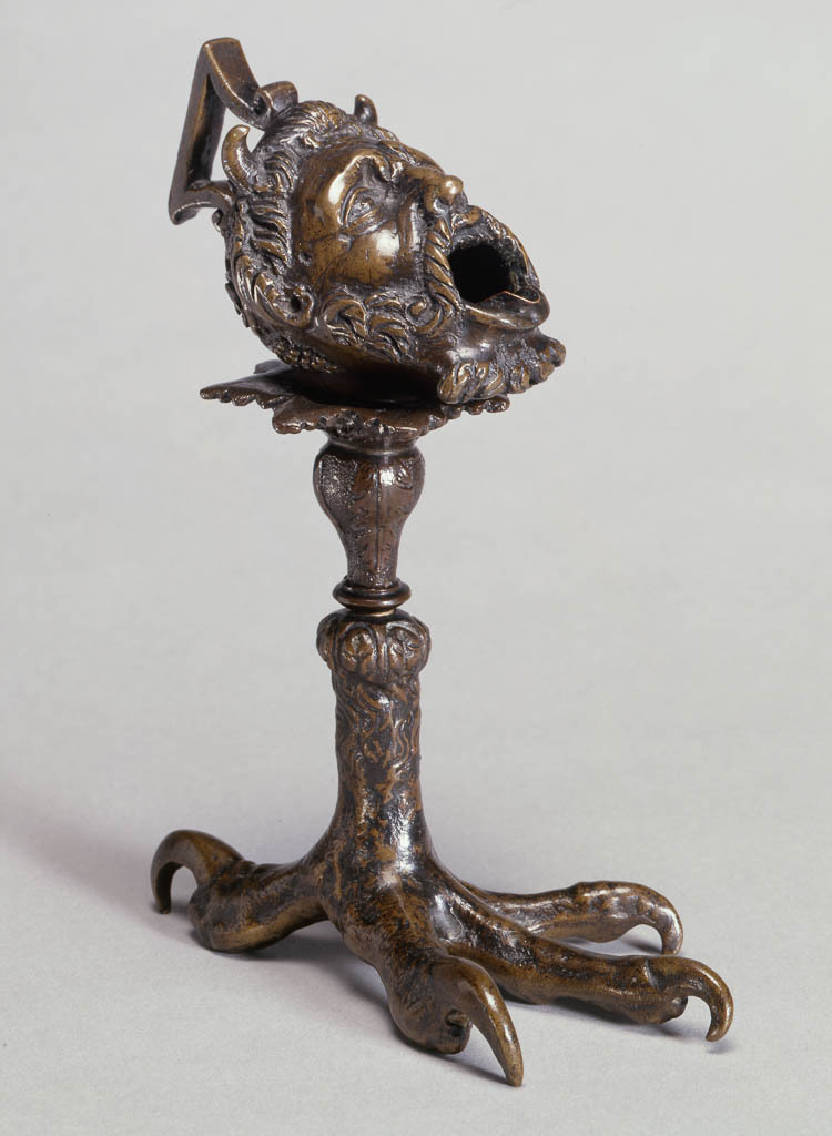 Oil lamp shaped as a satyr's head