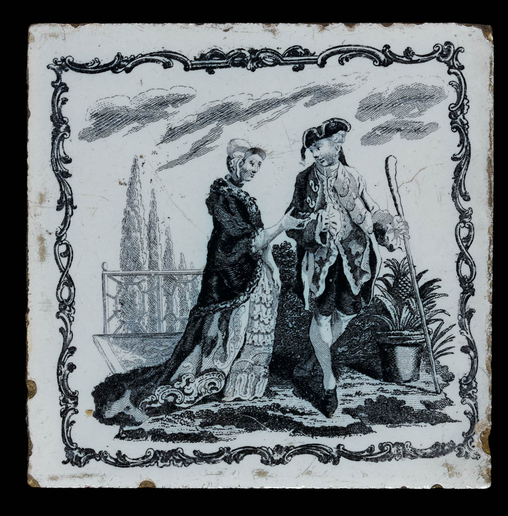 An image of English Delftware. Tile. A Couple in a Garden. Unidentified Liverpool pottery. John Sadler and Guy Green, printer, Liverpool. An elegant couple in a garden with a pineapple plant; '88' border. Buff earthenware, tin-glazed white on the upper surface and transfer-printed in grey-black, height, whole, 12.6 cm, width, whole, 12.6 cm, depth, whole, 0.6 cm, circa 1765-1775. Rococo. Notes: Made in Liverpool and printed by J. Sadler and G. Green. The design was derived from pl. 32 of The Ladies Amusement, 2nd edition, 1762 or 3rd edition, 1771, but is reversed.