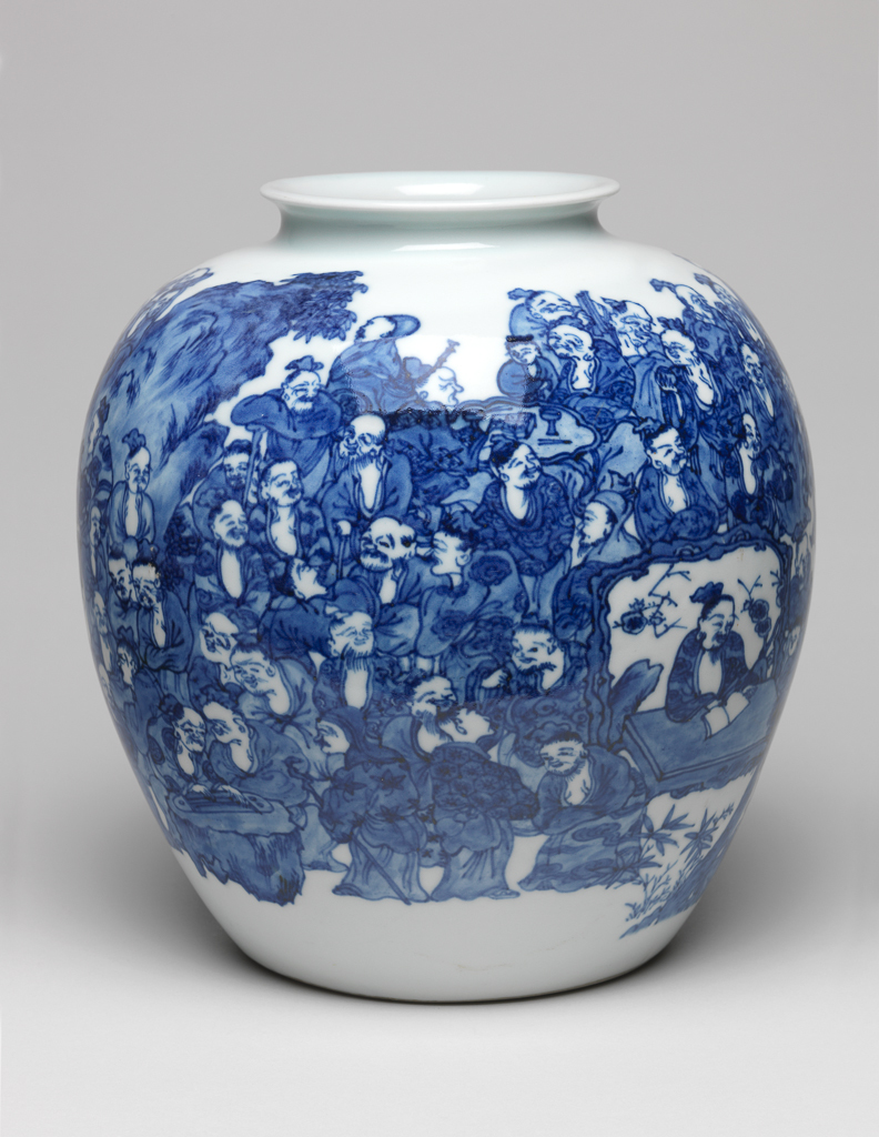 An image of Vase. Seifu (V) (Japanese). Decorated by Seifu V in the manner of Seifu II. Large vase, decorated in blue and white depicting 100 Arhat (people who are far along the path to Enlightenment). Hard-paste porcelain, 1945-1980. Shōwa era (1926-1989). Acquisition Credit: Given by David Hyatt King, through The Art Fund.