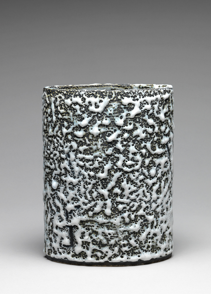An image of Contemporary Craft. Studio Ceramics. Vase. Cooper, Emmanuel (British, 1938-2012). Earthenware, with blackened surface and thick white glaze which has shrunk and dribbled, 2005. Gift of Nicholas and Judith Goodison through the National Art Collections Fund.