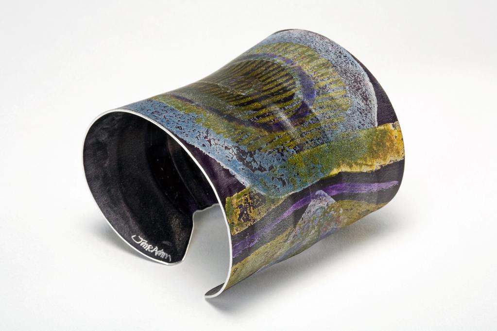 An image of Contemporary Craft/Jewellery. Bangle. Adam, Jane (British, b. 1954). Aluminium, anodised, block-printed, dyed and crazed, height, whole, 6.5 cm, width, whole, 6.3 cm, 2008. Gift of Nicholas and Judith Goodison through The Art Fund.