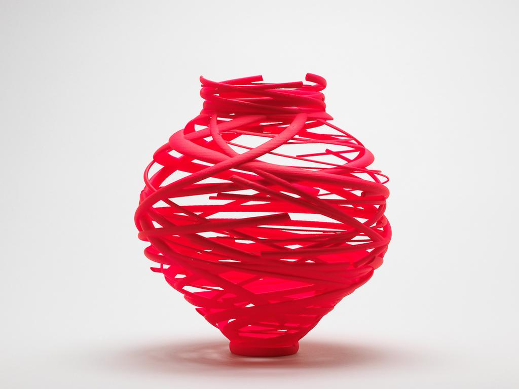 An image of Sculpture. Neon Pink Vortex. Eden, Michael (British). Sculpture made from high quality nylon material by Additive Layer Manufacturing (high quality 3D printing) with mineral soft coating no. 6. Edition 6/12. Nylon, mineral soft coating, height, whole, 24 cm, width, whole, 22 cm, diameter, whole, 16.5 cm, 2015. Acquisition Credit: Given by Sir Nicholas and Lady Judith Goodison, through the Art Fund.