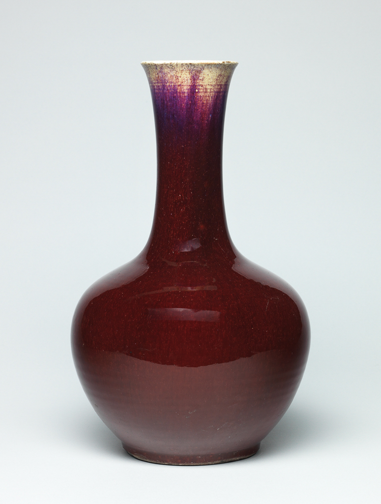 An image of Vase. Porcelain bottle shaped vase. Flambe glaze. Porcelain, glazed, height 37.5 cm, diameter 21.6 cm. Qianlong Period (1736-1795). Chinese.