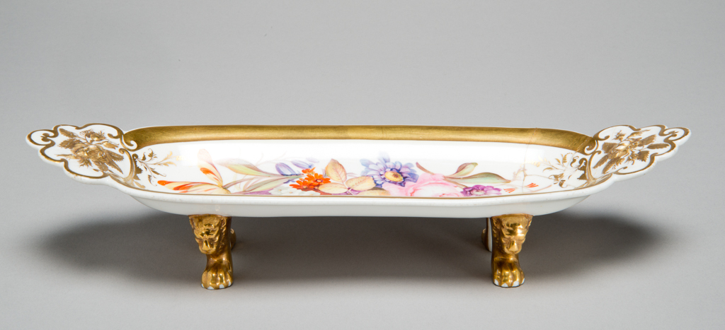 An image of Pen Tray. Rockingham China Works. Soft-paste porcelain, painted in polychrome enamels and gilt, height, whole, 2 3/8 in, length, whole, 10 1/2 in, circa 1830. England, Yorkshire, Swinton.