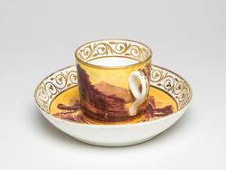 An image of Coffee can and saucer