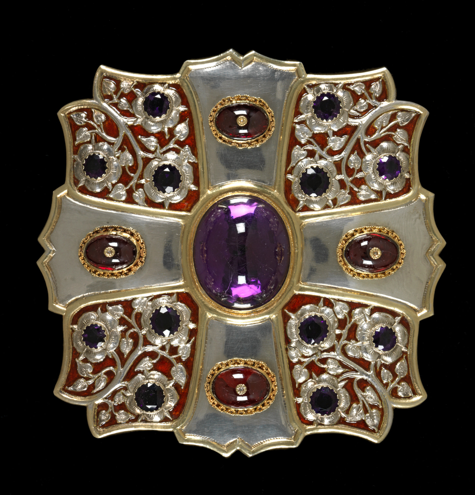 An image of Morse. Krall, Carl Christof (1845-1919). Silver, silver gilt and reddish brown translucent enamel set with amethysts and garnets. Maker’s mark of Carl Christof Krall. In red leather covered box lined with red velvet and white silk painted in gold ‘BARKENTIN & KRALL/ Goldsmiths/ 291/ REGENT ST. W.’ (A). 1898. Lent to the museum by The Keatley Trust.