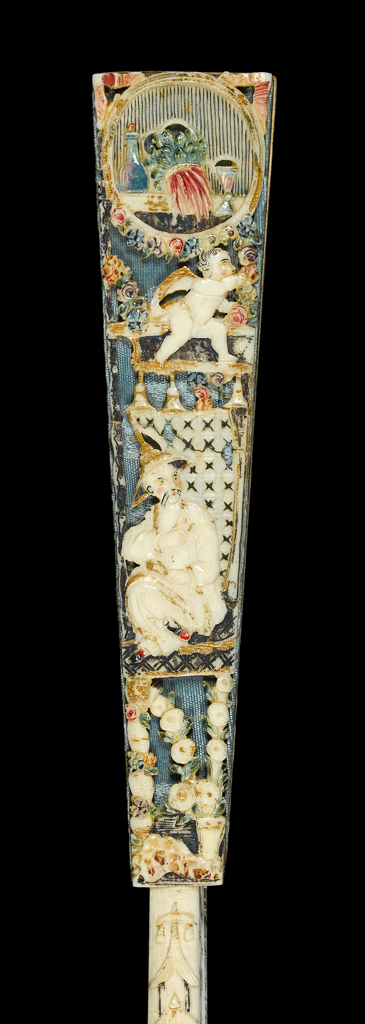 An image of Folding Fan. Double leaf of paper, painted in bodycolour and gilt. Sticks and guards of pierced, fretted, carved, painted and gilt ivory (10+2), the piercing of the guards backed with blue silk, and the head strengthened with tortoiseshell. Rivet set with clear pastes. Length (guards) 28.8 cm, width (leaf) 52 cm. Circa 1750-1760. Italian.