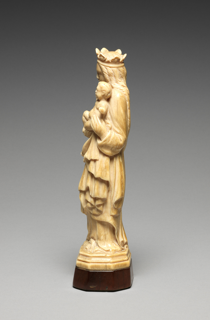 An image of Sculpture/Figure. Virgin and Child. Ivory carved in the round, height, whole, 7 1/4 inches, circa 1600-1700. Germany (south). From a provincial workshop.