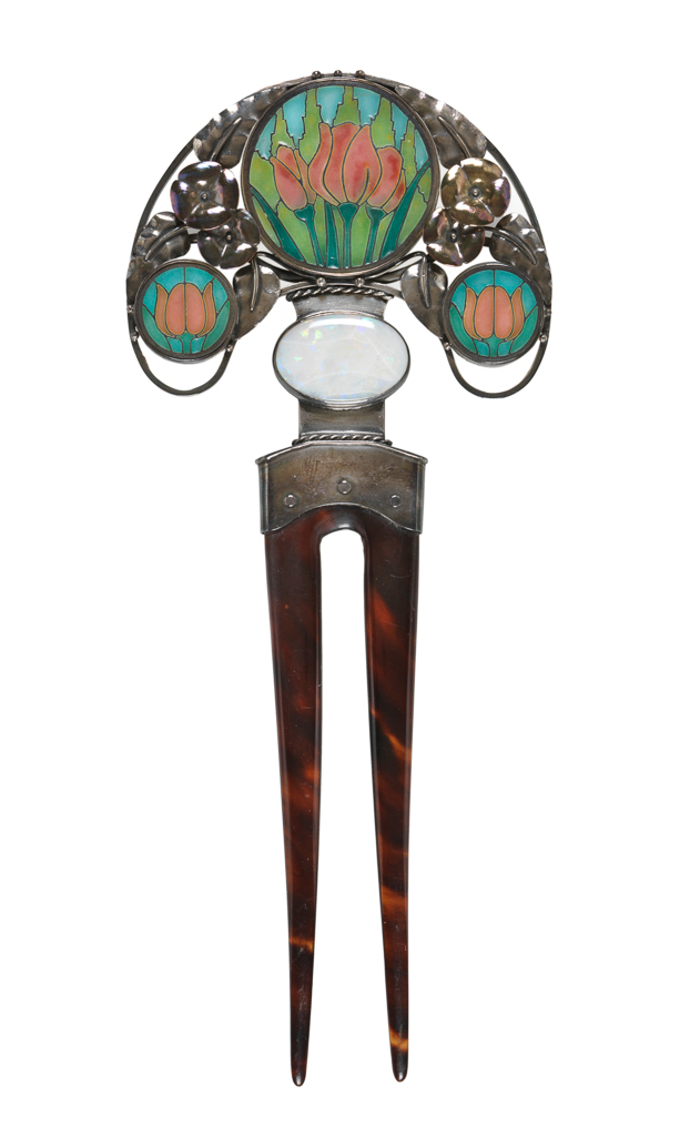 An image of Hair ornament. Wilson, Henry (British, 1864-1934), attributed. Silver and gold, inset with turquoise, pink, pale and dark green plique-à-jour roundels of tulips and an oval opal, mounted on a tortoiseshell two-pronged hair pin. 1900-1905. English. Art Nouveau. Acquisition Credit: Given by Mrs J. Hull Grundy.
