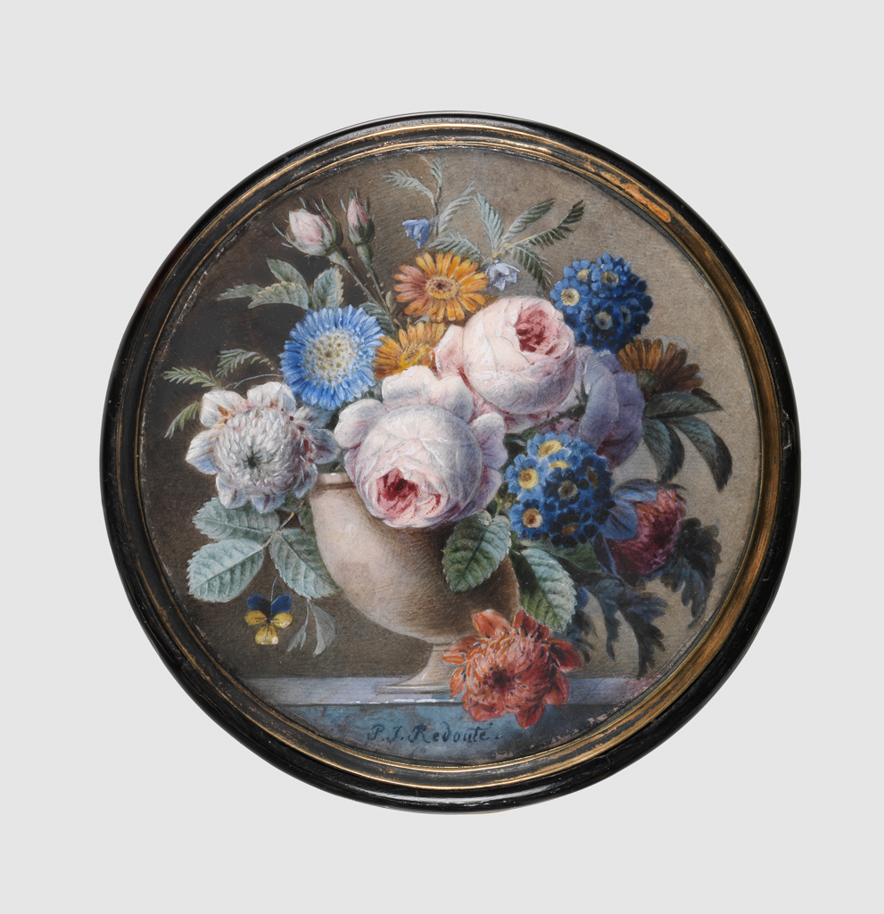 An image of Miniature. Tortoise-shell box with a miniature of flowers in a stone vase on a marble slab. Redouté, Pierre Joseph (Flemish, 1759-1840). Unknown box maker. Tortoise-shell and gold with a miniature in watercolour and bodycolour on card, mounted in gilt metal and set under glass. The circular miniature depicts a pale stone vase of flowers, including heartsease, anemones, blue aster, marigolds, campanula, auricula and centifolia roses, on a marble slab. Height (whole box) 2.8 cm, diameter (whole box) 8.5 cm, 1827-1840. Acquisition: bequeathed 1973 by Henry Rogers Broughton Fairhaven.
