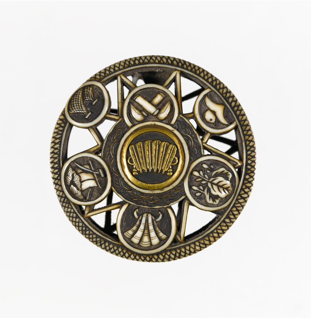 An image of Ryusa Manju, a group of family crests (Mon). Carved ivory and gold, 1830-1870. Japanese.
