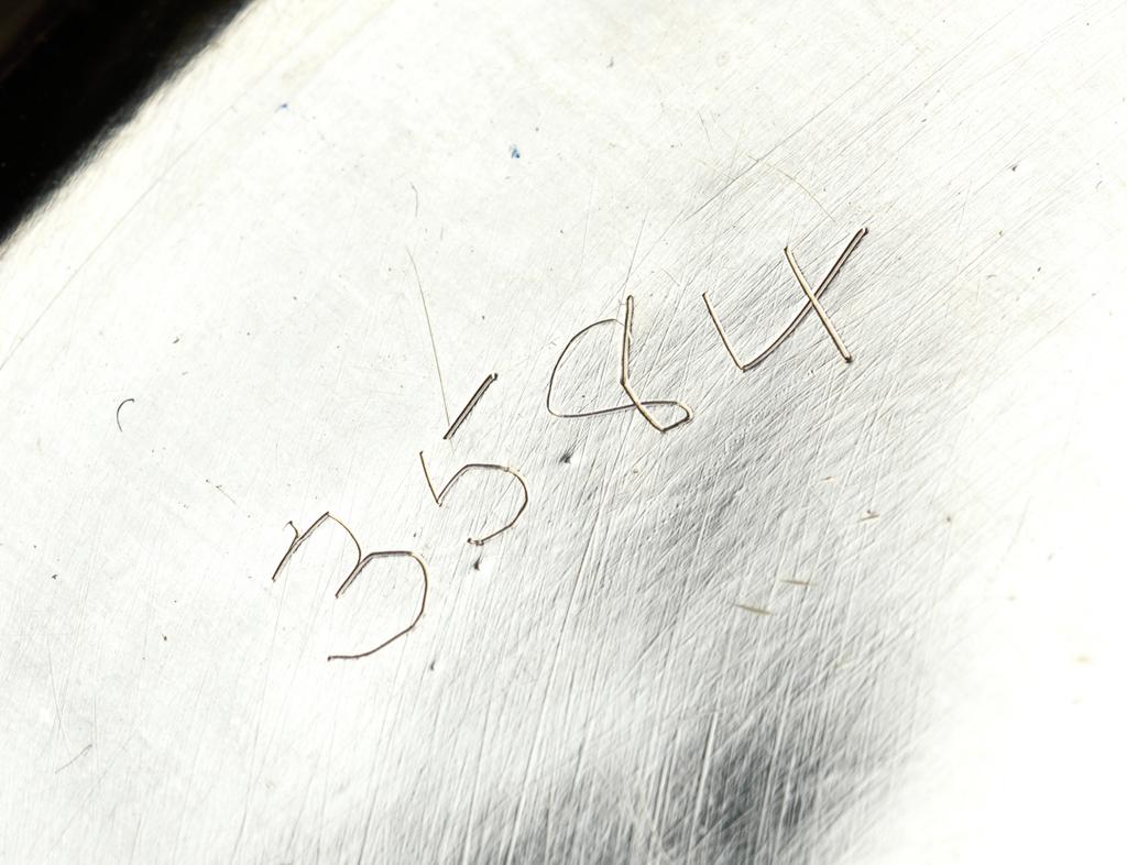 An image of Silverware. Bowl with lid. Guild and School of Handicraft, Chipping Campden. Silver bowl with lid, enamelled with a forest scene. Silver, enamel, 1902. English. Acquisition Credit: Given by the estate of the late Olive and Peter Ward.