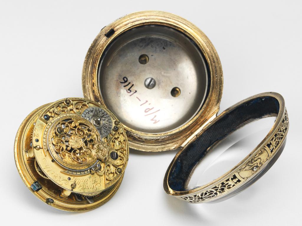 An image of Watches. Silver gilt watch. Inscribed "Thomas Gainsborough Bath, 1771" in gothic script on the outer case. Versailles, James Keith (French). Silver, height 7 cm, 18th century.