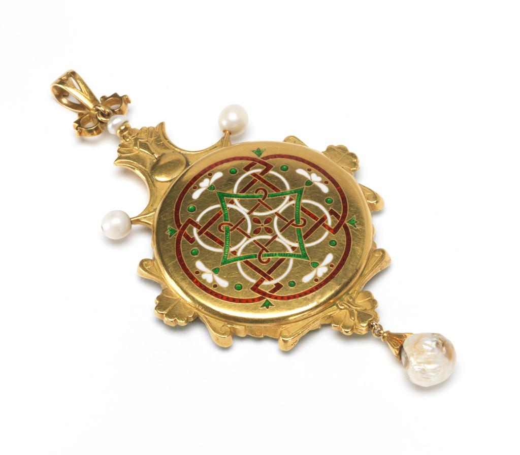 An image of Pendant: Pegasus Drinking from the Fountain of Hippocrene. Carlo & Arthur Giuliano & Ricketts, Charles de Sousy (British, 1866-1931). Pendant of gold and enamel set with pearls, decorated on the front with Pegasus drinking from the Fountain of Hippocrene, and enclosing a miniature of Miss Edith Emma Cooper (1862-1913) in profile to right against a blue ground. Gold, enamelled in royal blue, green, red, and white, and set with four cut garnets, a cabochon garnet, two large pearls, one small pearl, and a baroque pearl. (A). Height (whole) 10.1 cm, width (whole) 5.1 cm, diameter 34 mm, 1901.