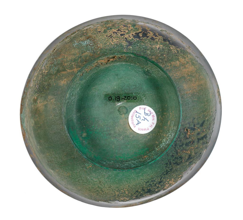 An image of Metalwork/Bowl. Unknown Maker. Bowl in grey bronze with vivid green patination, of elegant flared shape, fastened to a rivet to a hollow conical foot, height, whole, 8.5 cm, before 1392. Production Place: Korea. Period: Koryô (918-1392) or earlier.