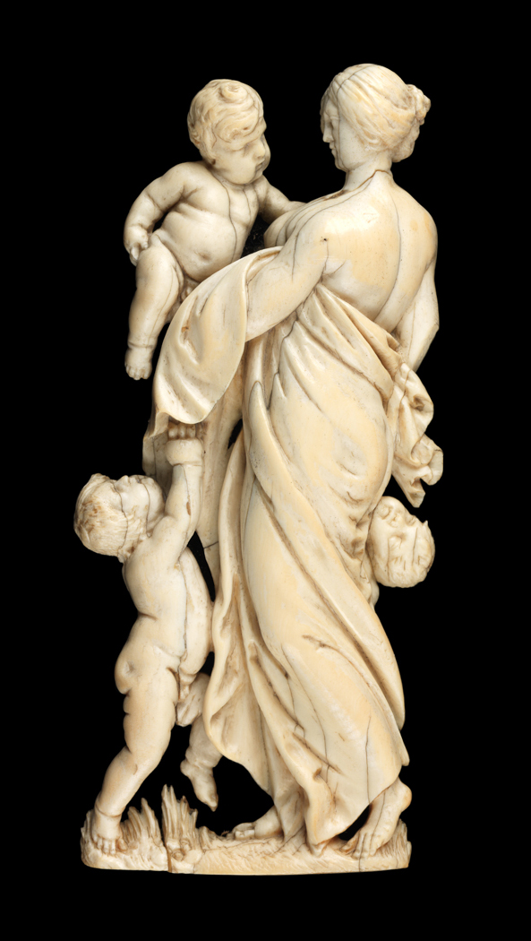 An image of Sculpture / Relief. Charity. Ivory carved in relief, and mounted under glass in an oval gilt frame. Circa 1700-1800. French, German or Italian.