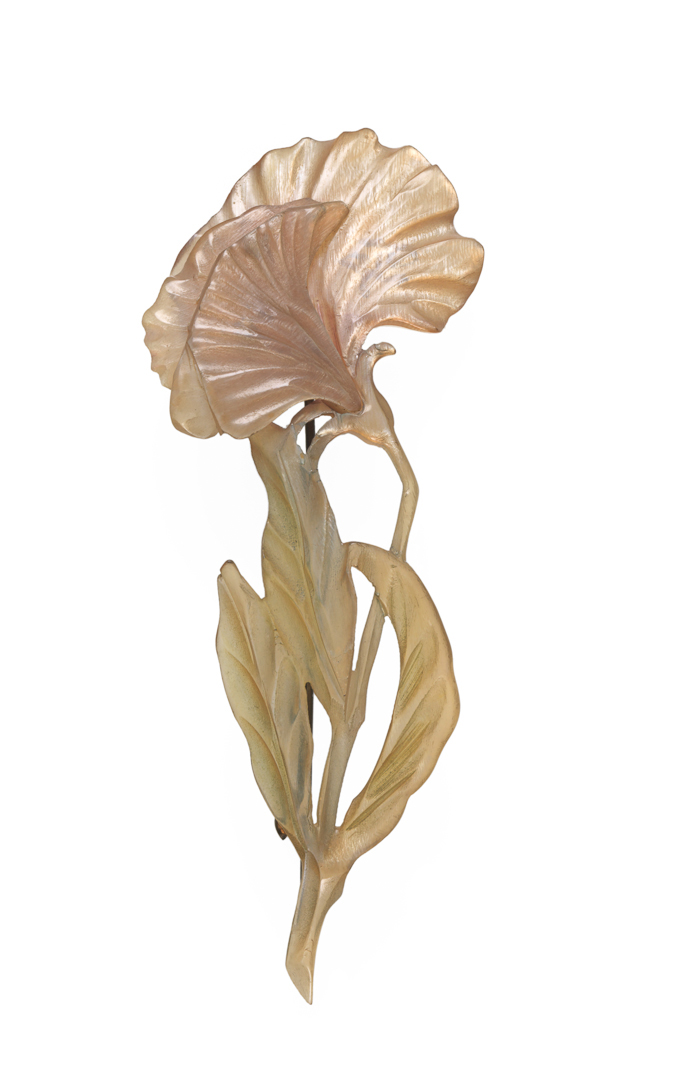 An image of Jewellery. Brooch. Pierre, Georges, Paris, Colmar. A flower on a stem with three leaves. Signed 'GIP; on the back of the flower. Gilt-metal pin fastener on the back. Horn, carved and stained pink and green, height, whole, 9.5 cm, width, whole, 3.9 cm, circa 1900-1910. Art Nouveau. Acquisition Credit: Given by Mrs J. Hull Grundy.