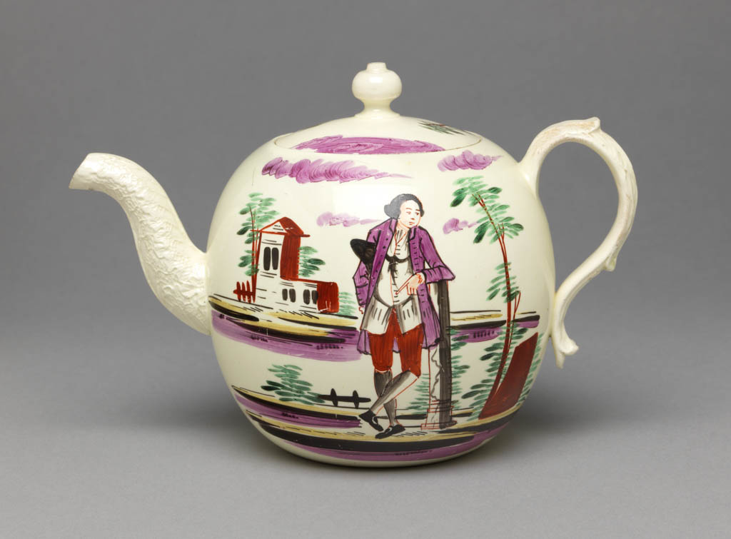 An image of Teaware. Teapot and cover. Wedgwood, Josiah (British, 1730-1795). Production: England, Staffordshire, Burslem. The pot has a globular body with moulded overlapping leaf spout and reeded and leaf-moulded handle. The circular, slightly domed cover has a pierced globular knob. One side of the pot is decorated with a gentleman leaning on a post in a landscape with a building on the left; on the other side with two buildings in a landscape; and on the cover with one building between trees. Cream-coloured earthenware, lead-glazed, painted in green, yellow, pale purple, reddish-brown, and black enamels. Height, whole, 13.6 cm, length, whole, 19.6 cm, circa 1770-1775. Rococo.  Production Note: Probably enamelled in London. The decoration is in the style associated with David Rhodes. Acquisition Credit: Given by Sir Ivor and Lady Batchelor.