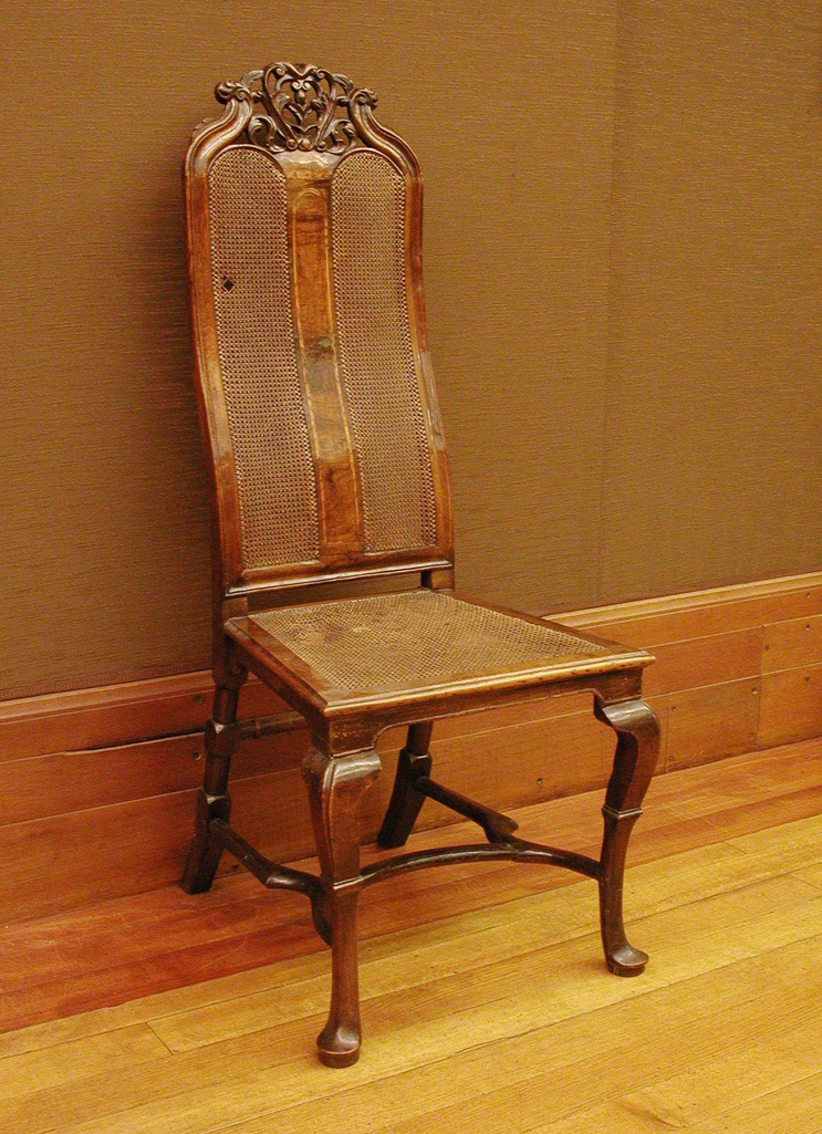 An image of Furniture. Chair. Unknown production, England. Walnut, with cane seat and back, height, whole, 125.5 cm, width, 51.2 cm, depth, 43.7 cm, circa 1700. William and Mary. Notes: One of a pair with M/F.8-1938.