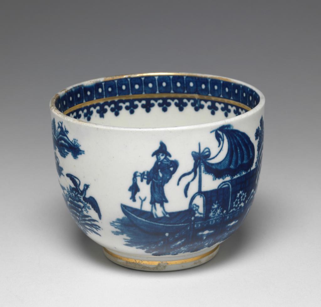 An image of Sugar bowl. Worcester Porcelain Factory. With scenes in Chinese style. The circular bowl has steep, rounded sides, and stands on a v-shaped footring. The sides are printed with the 'Fisherman and Cormorant', or 'Pleasure Boat', pattern, the rim and foot banded in gilt. Soft-paste porcelain, moulded, glazed and printed underglaze in blue and gilt, height, whole, 8.0, m, diameter, whole, 10.4 cm, circa 1780-1790.
