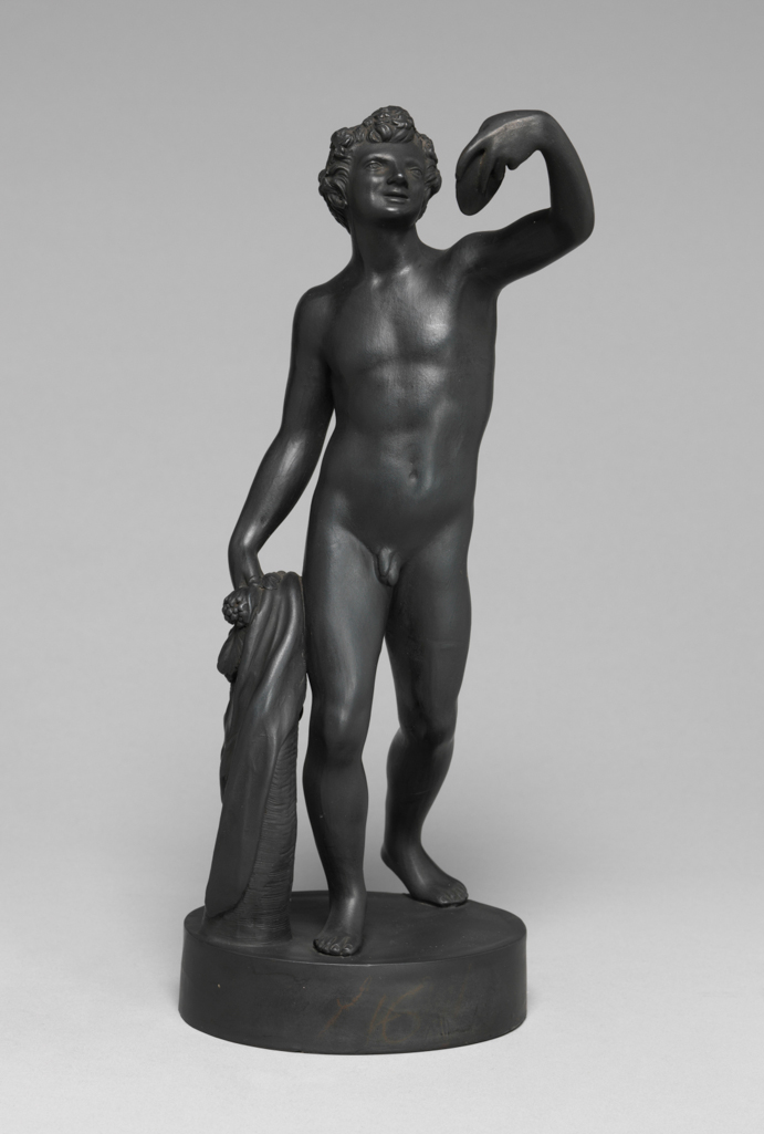 An image of Stoneware Figure. Bacchus. Wedgwood. After the marble made by Jacopo Sansovino (1486-1570) for Giovanni Gaddi in 1511-12, and now in the Museo Nazionale, Florence. Production Place: England, Staffordshire. Black basalt, moulded, height, whole, 27.7 cm, after 1780 to before 1860.