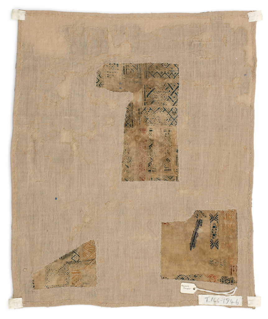 An image of Textiles. Spot motif sampler. Linen embroidered with polychrome silks in pattern darning and running stitch. One edge has a selvedge the others are either damaged or incomplete. The sampler is mounted on a linen backing. Length, max, 37 cm, width, max, 30 cm, circa 1401 -1501. Mamluk. Notes: The patterns found on this sampler are very close to those found on fragments of clothing and household linen of a similar date.