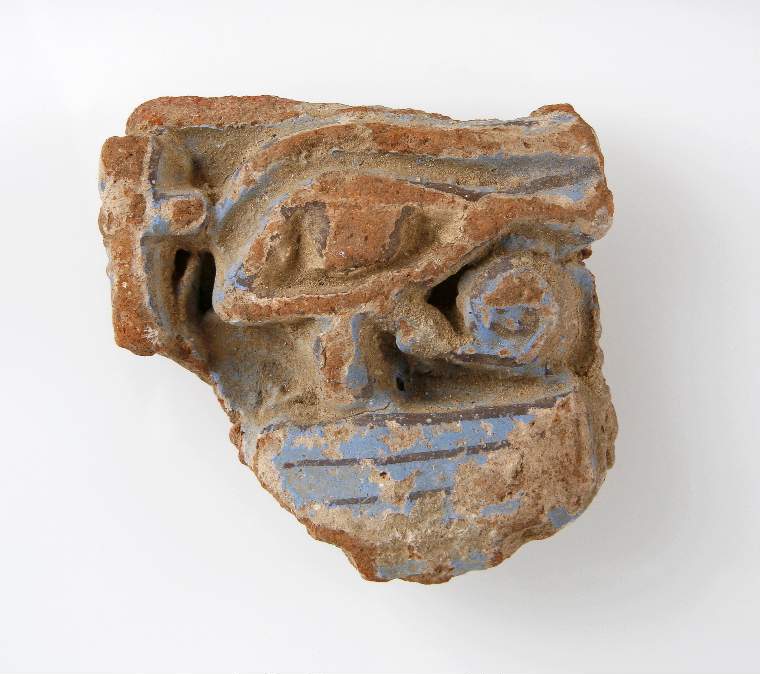 An image of Clay vessel fragmentsfragment of body of jar, with applied decoration of wedjat eye and black painted lines:a hand-modelled 'wadjet' eye from an open vessel.