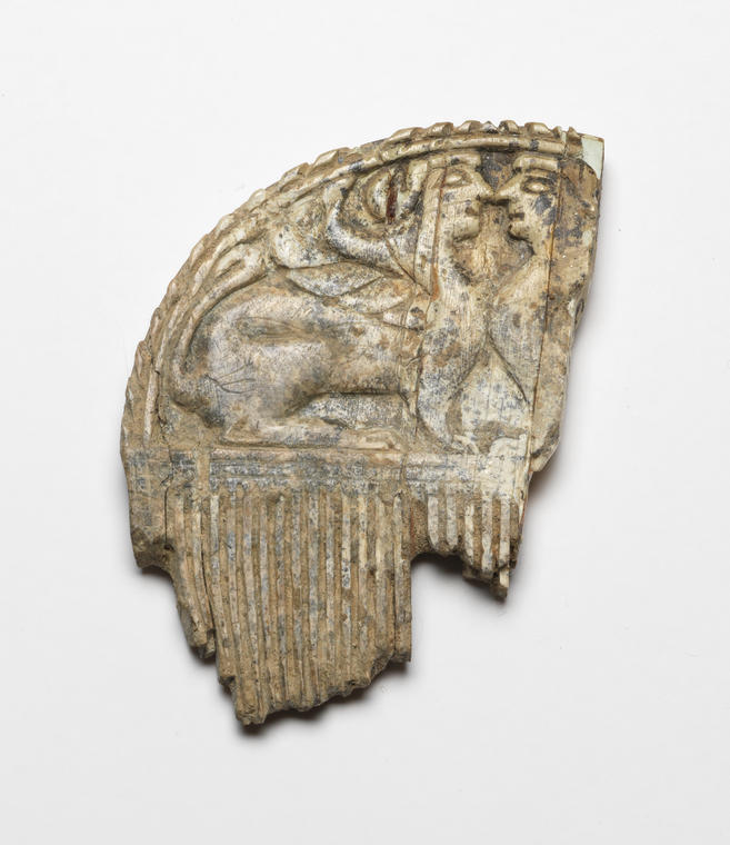 An image of Cosmetic equipment/Comb, carved with Sphinxes and Lions. Height 0.044 m, width 0.03 m, circa 650-630 B.C. Find Spot: Temple of Artemis Orthia, Sparta, Greece.