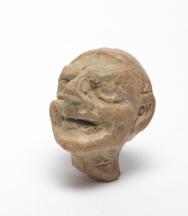 An image of head of mime-player Production Notes  mould-made Dimensions height 0.032 m