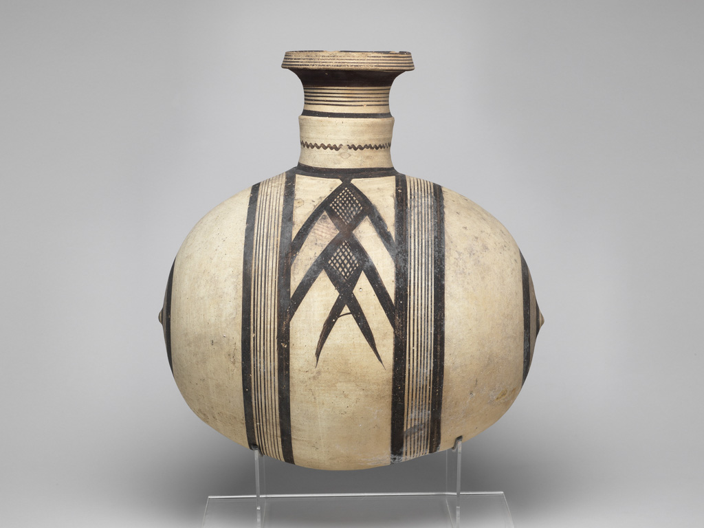 An image of Vessel/Jug. Barrel-shaped jug with concentric circles. Production Place: Cyprus. Clay. Cypriot Iron Age. Lewis Collection.