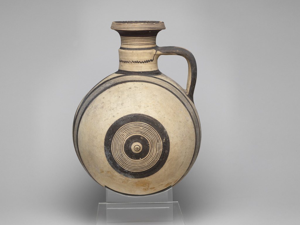 An image of Vessel/Jug. Barrel-shaped jug with concentric circles. Production Place: Cyprus. Clay. Cypriot Iron Age. Lewis Collection.