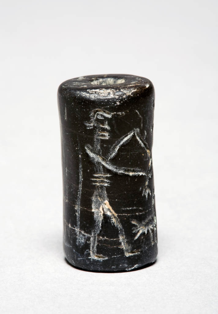An image of Seal. Black inscribed cylinder seal. Basalt, height 0.030 m, width 0.016 m, circa 2230-2000 B.C. Notes: inscription faded, fake. Post-Akkadian/Ur III. Cf. Collon WAS II figs. 247, 249.