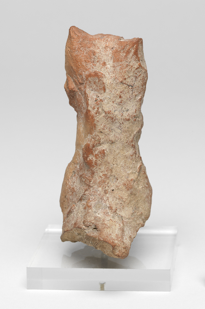 An image of Figure/Figurine fragment. Horse's head. Production Place: Cyprus. Find Spot: Salamis, Cyprus. Clay, moulded, height 0.099 m, width 0.066 m, 600-501 B.C. Archaic Period.