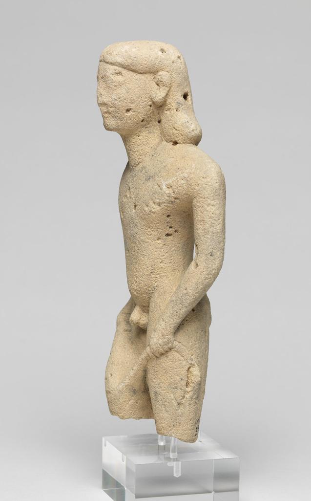 An image of Figure/Statuette. Man, grappling with lion. Production Place: Cyprus. Find Spot: Salamis, Cyprus. Limestone, height 0.175 m, 600-501 B.C. Archaic Period.