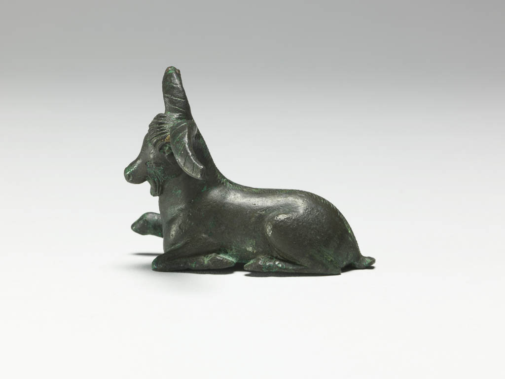 An image of Figure/Statuette. Goat. Production Place: Corinth, possibly. Bronze, height 0.047 m, width, 0.061 m, depth 0.048 m, maximum, 500-401 B.C. Classical Period.