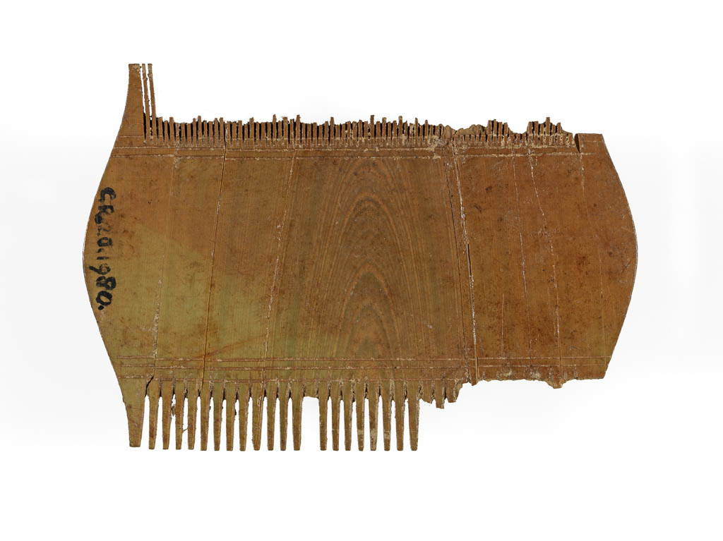 An image of Cosmetic Equipment/Comb. Ivory, carved, length 0.075 m, 1-100 AD. Early Roman.