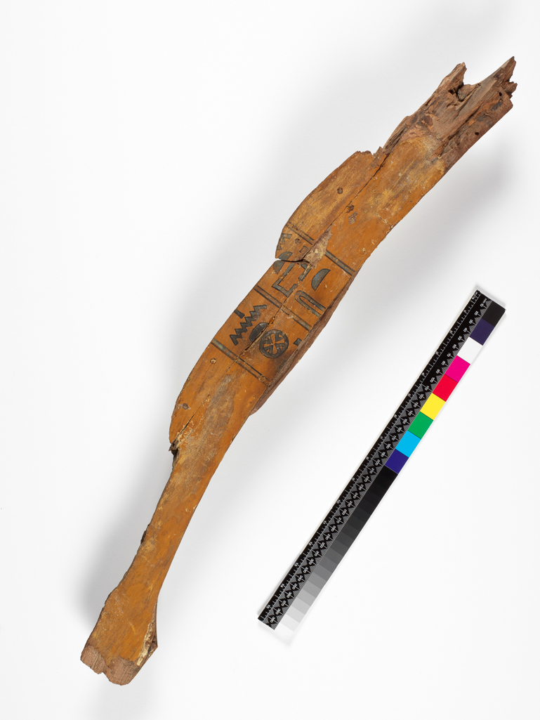 An image of Funerary Equipment. Coffin fragment of an unknown woman. Inscribed with coffin texts. Production Place: Egypt. Find Spot: Asyut (?), Egypt. Wood, painted, height 0.077 m, width 0.727 m, thickness 0.028 m, circa 2055 to circa 1985 B.C. Middle Kingdom.