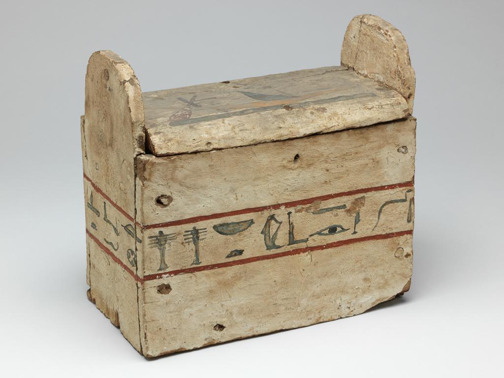 An image of Funerary equipment. Shabti box, inscribed for Pasherienusiraa, decorated with a boat on lid. Production Place: Egypt. Find Spot: Thebes. Wood, covered with gesso and painted, height 29.5 cm, length 29.00 cm, width 16.00 cm, 745- 664 B.C. Twenty-fifth Dynasty; Kushite.