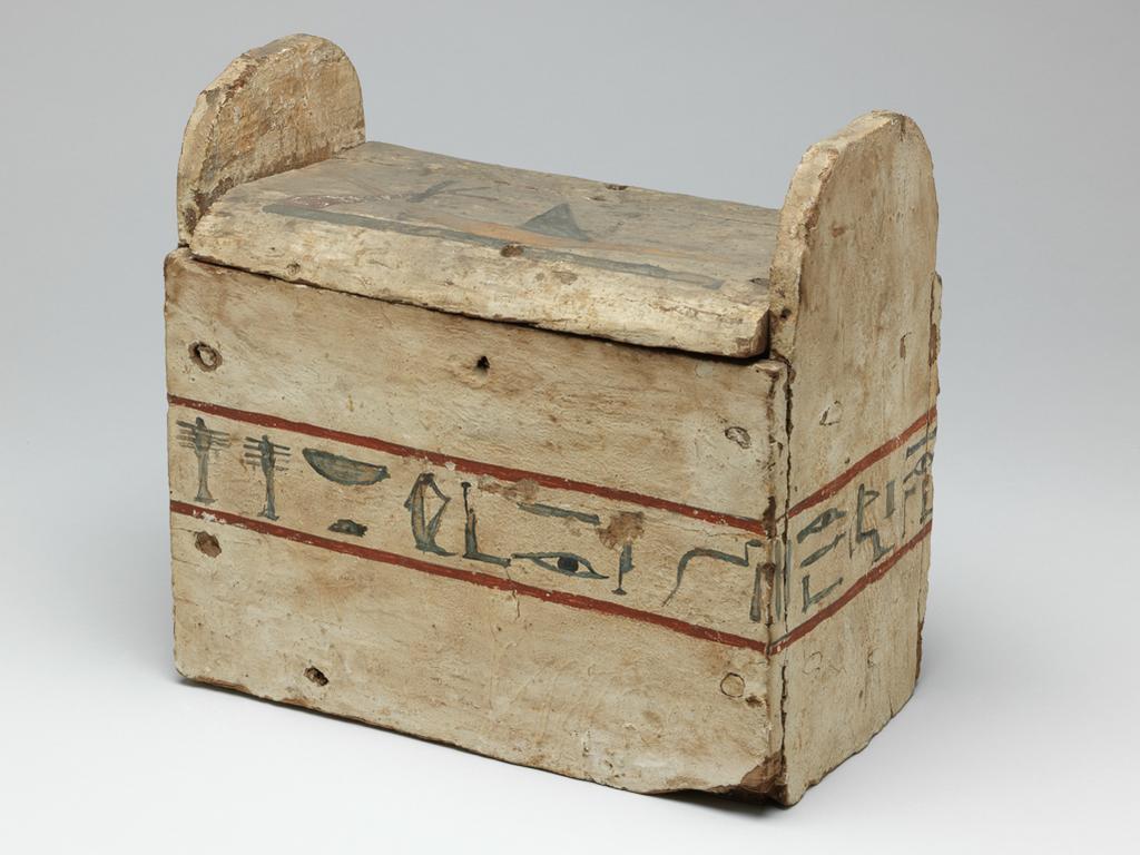 An image of Funerary equipment. Shabti box, inscribed for Pasherienusiraa, decorated with a boat on lid. Production Place: Egypt. Find Spot: Thebes. Wood, covered with gesso and painted, height 29.5 cm, length 29.00 cm, width 16.00 cm, 745- 664 B.C. Twenty-fifth Dynasty; Kushite.