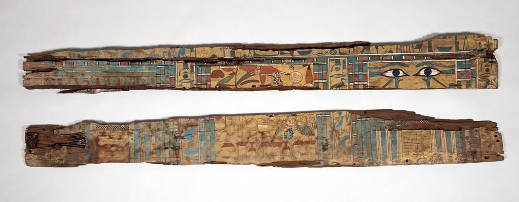 An image of Funerary Equipment. Painted wooden coffin panels. Coffin, long side with eye panel. From the side of a box coffin, the eye-panels on the exterior of this type of coffin allow the deceased to see out of the coffin. Production Place: Egypt. Find Spot: Beni Hasan; tomb 94. Painted wood, 1985- 1773 B.C. Twelfth Dynasty; Middle Kingdom.