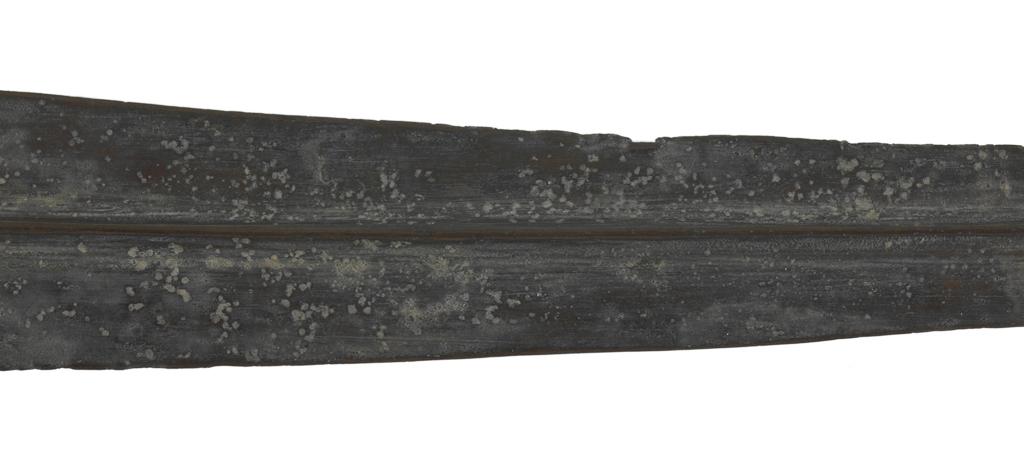 An image of Weapons. Sword. Production Place/Find Spot: Cyprus; tomb. Bronze, depth 0.005 m, width 0.045 m, 2100-1601 B.C. Early Cypriot III - Middle Cypriot II. Bronze Age.
