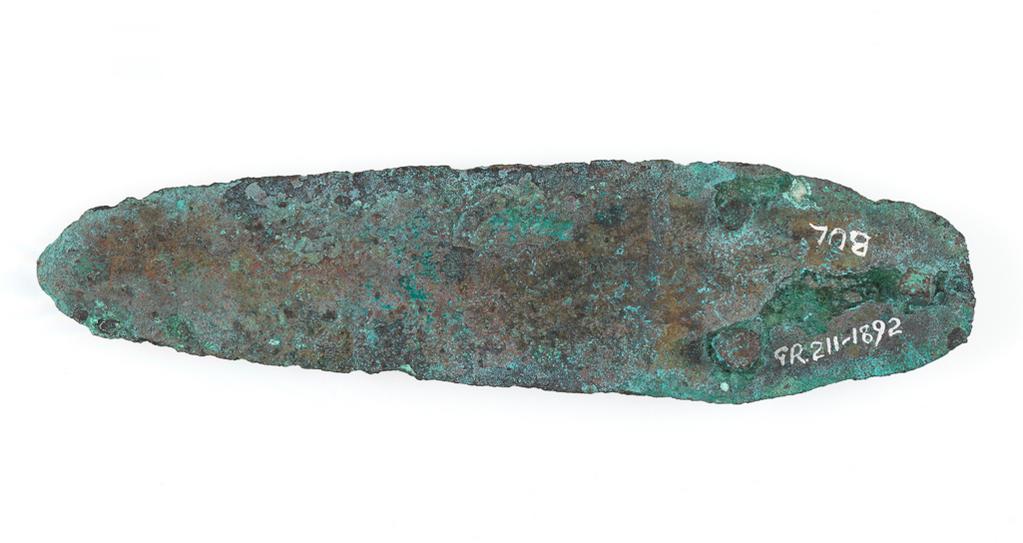 An image of Weapons. Dagger. Find Spot: Tamassos, Cyprus. Bronze, length 0.13 m, width 0.034 m, 2100-1201 B.C. Early Cypriot II - Late Cypriot II. Bronze Age.