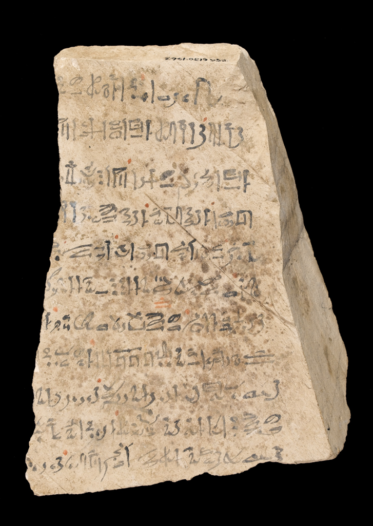 An image of Written Document. Ostracon, hieratic text, both sides, black and red ink. Production Place/Find Spot: Egypt. Limestone, length 0.156 m, width 0.209 m. New Kingdom.