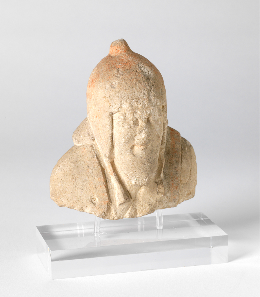 An image of Figure/statuette. Man, wearing cap. Production Place: Cyprus. Find Spot: Salamis, Cyprus. Limestone, height 0.09 m, 600-501 B.C. Archaic Period.