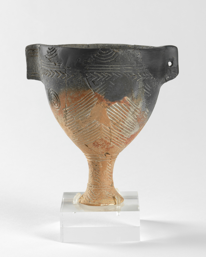 An image of Vessel. Goblet. Production Place: Cyprus. Find Spot: Vounous Cyprus; Tomb 84. Clay, red-polished ware, width, 0.125, m,  2400 to 2201 B.C. Early Cypriot I. Bronze Age.