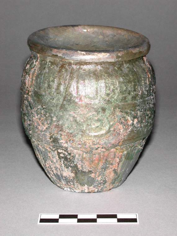 An image of Vessel/ Jar. Glass, mould pressed, AD 1-100. Early Roman Period. Find Spot: Tremithos, Cyprus. Production Place: Eastern Mediterranean. http://data.fitzmuseum.cam.ac.uk/id/object/65859